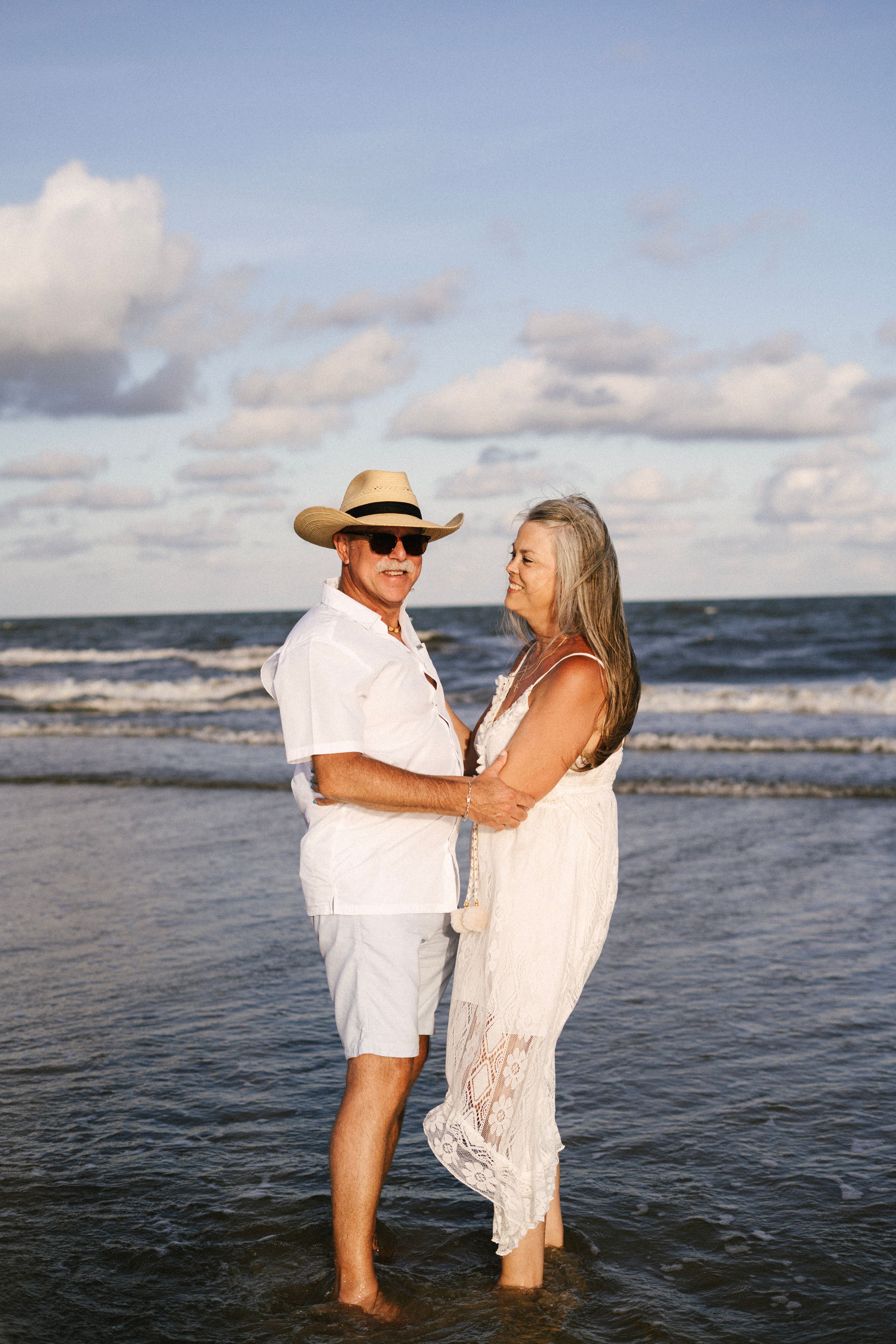 Family session on the beach at Galveston, TX. Natural light, candid moments, lifestyle photography, kid photography, couple photography,