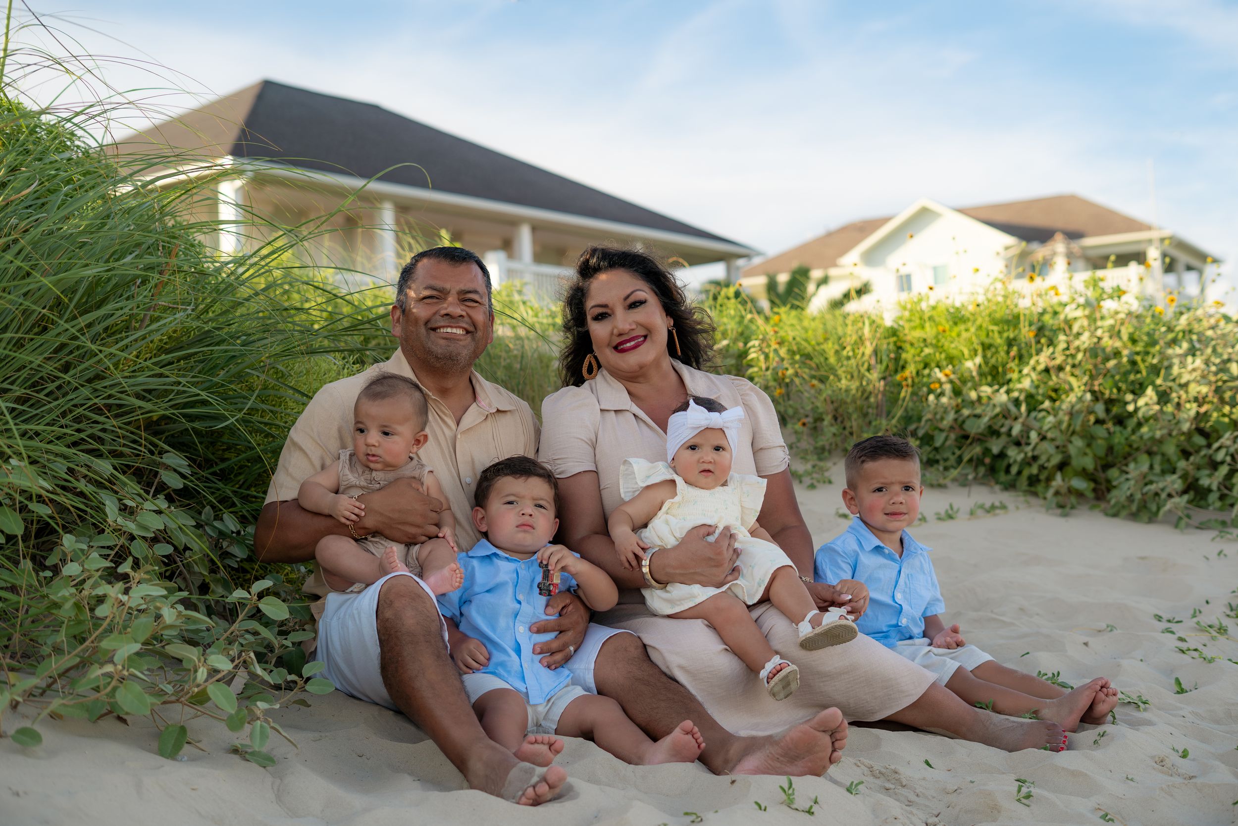 Family session on the beach at Galveston, TX. Natural light, candid moments, lifestyle photography, kid photography, couple photography,