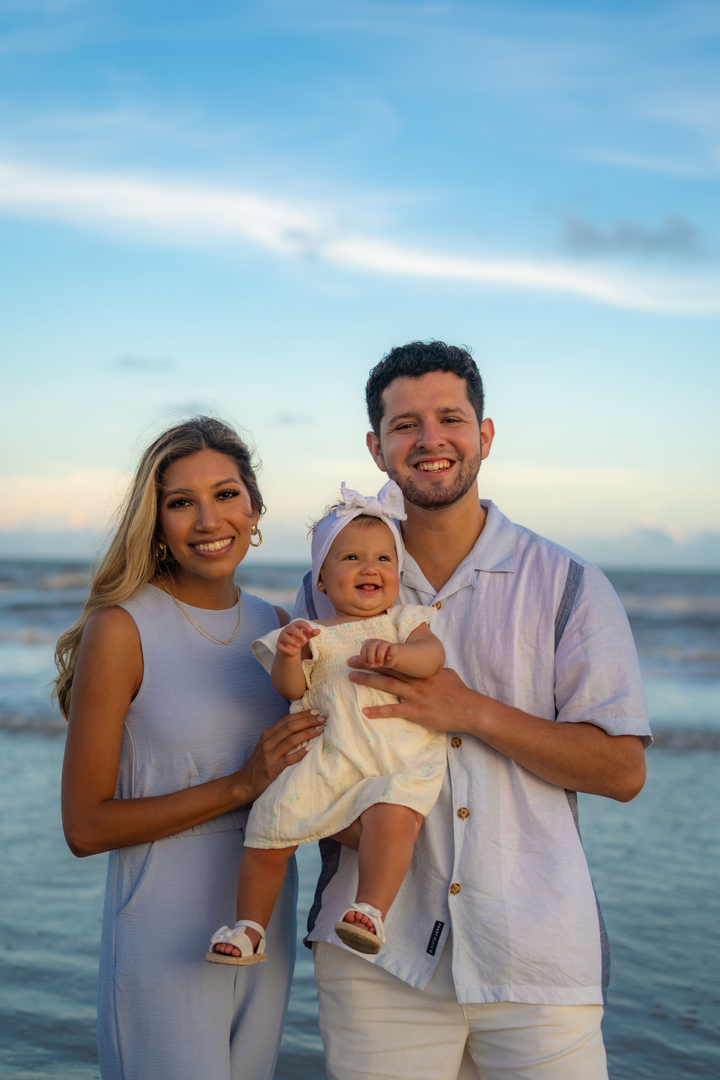 Family session on the beach at Galveston, TX. Natural light, candid moments, lifestyle photography, kid photography, couple photography,