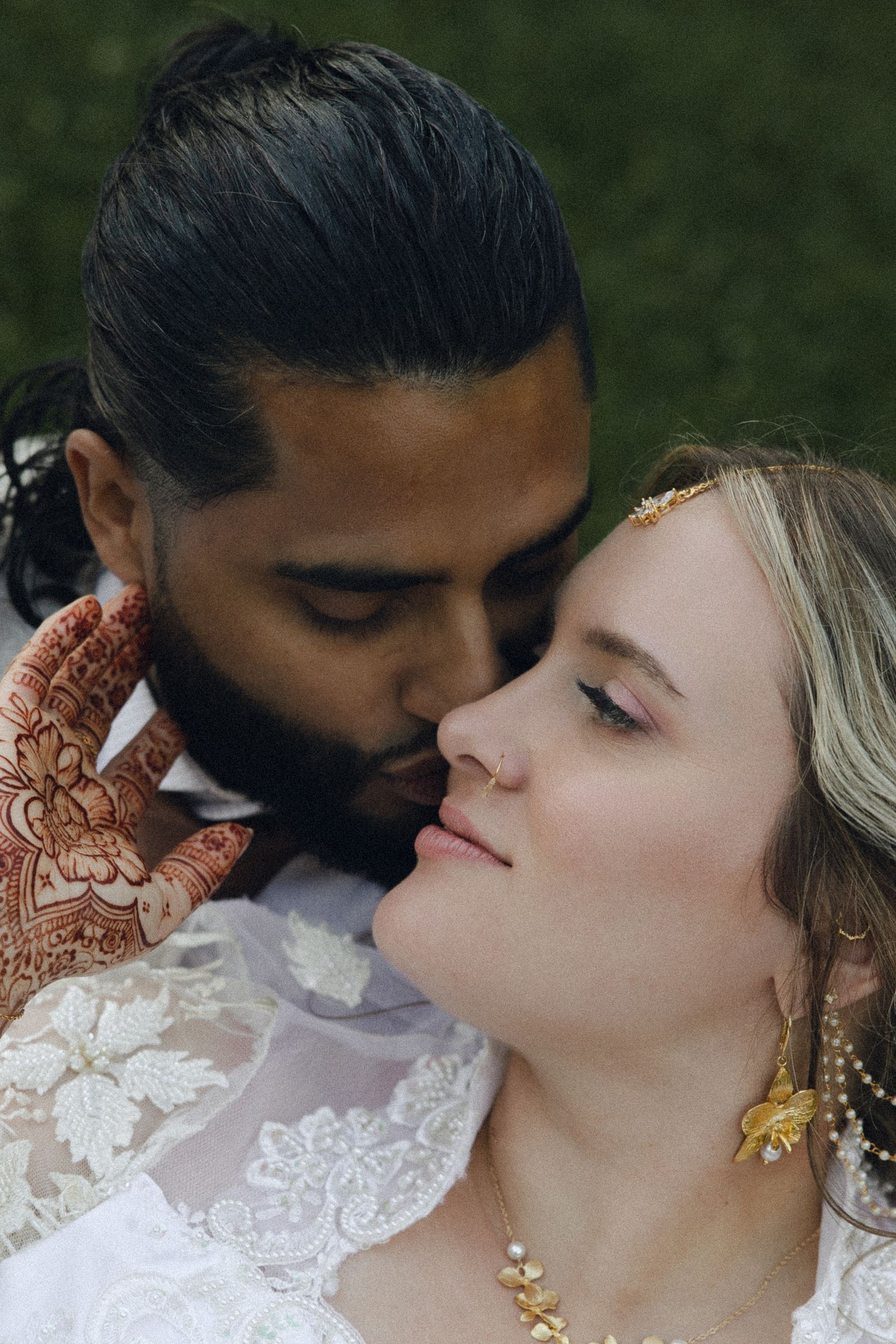 A romantic sequence of wedding photos showing tender moments between a couple in traditional wedding attire.
