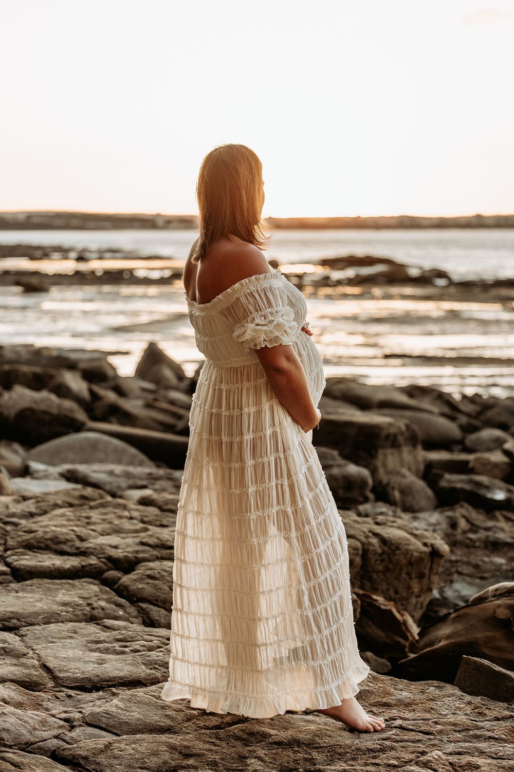 Maternity photography session at Point Cartwright beach on the Sunshine Coast.
