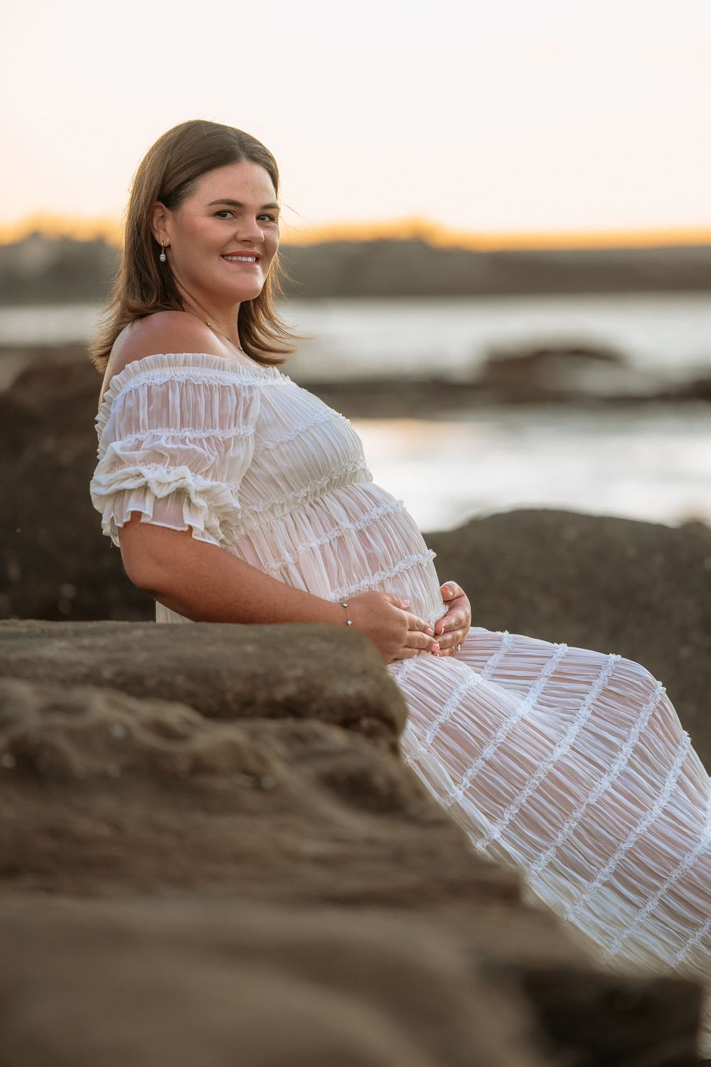 Maternity photography session at Point Cartwright beach on the Sunshine Coast.