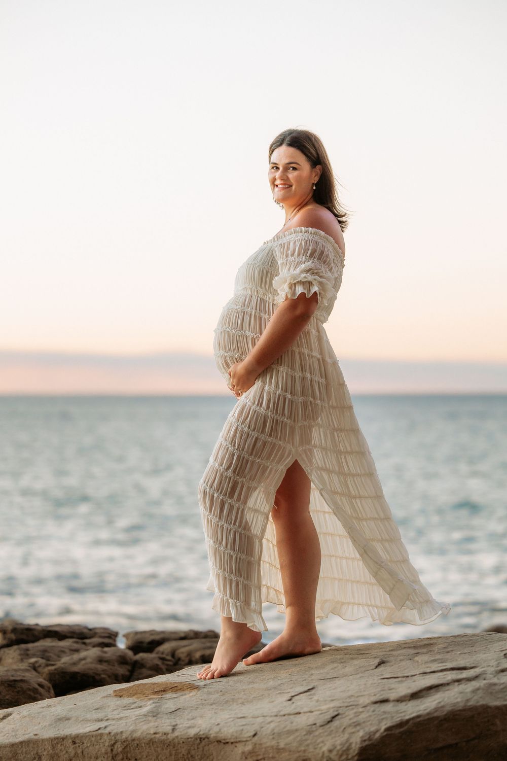 Maternity photography session at Point Cartwright beach on the Sunshine Coast.