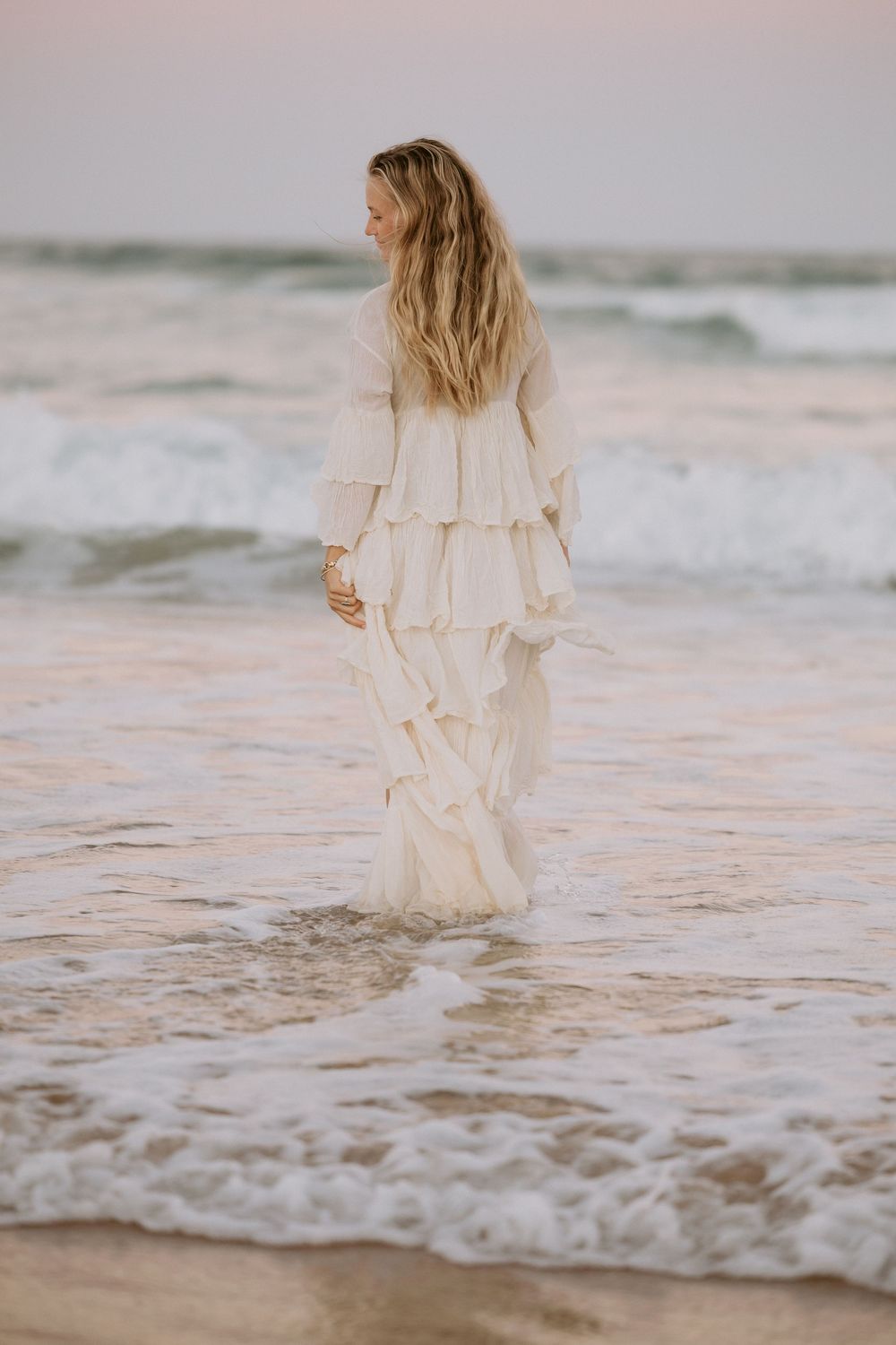 Sunset golden hour Maternity photography session overlooking Mudjimba beach on the Sunshine Coast.