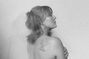A series of black and white artistic portrait photographs showing different poses and expressions.