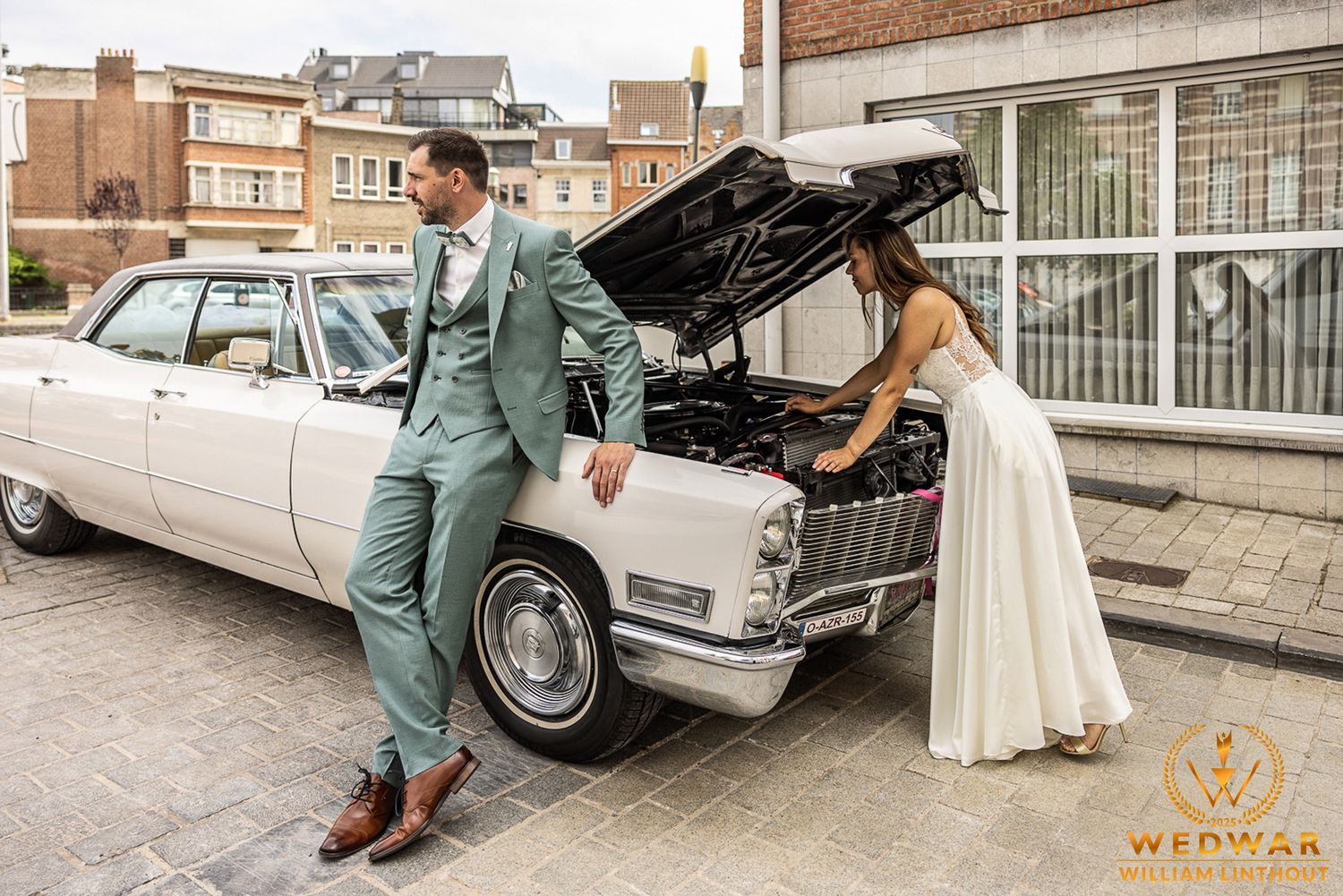 Creative wedding photo at subway platform with motion blur of passing train.