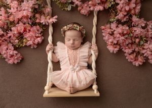 Newborn baby photographer east cork photography baby on swing