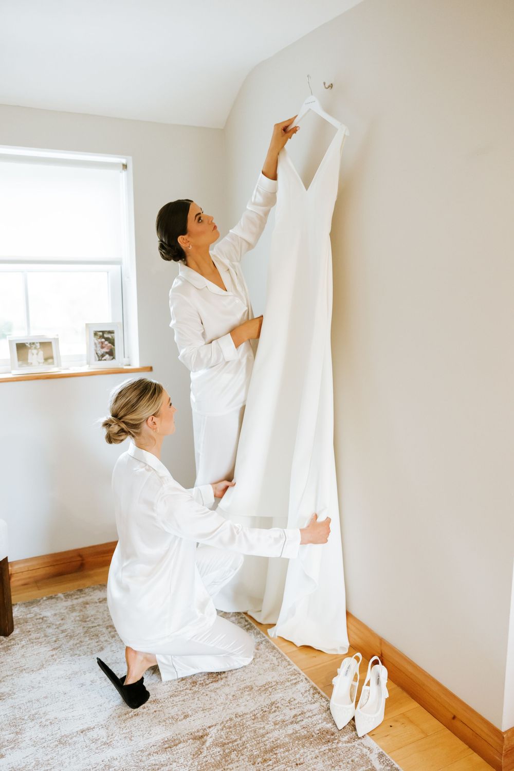 A series of candid moments showing someone in a white robe getting ready in a bright interior room. Castle Leslie