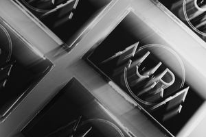 Black and white close-up photograph of a NVIDIA graphics card logo on computer hardware.