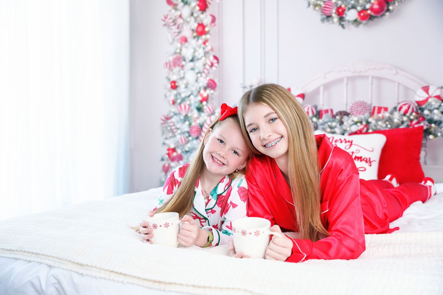 Family in Christmas pajamas Midland TX Christmas minis peppermit christmas minis photographers midland tx holiday family photos family minis
