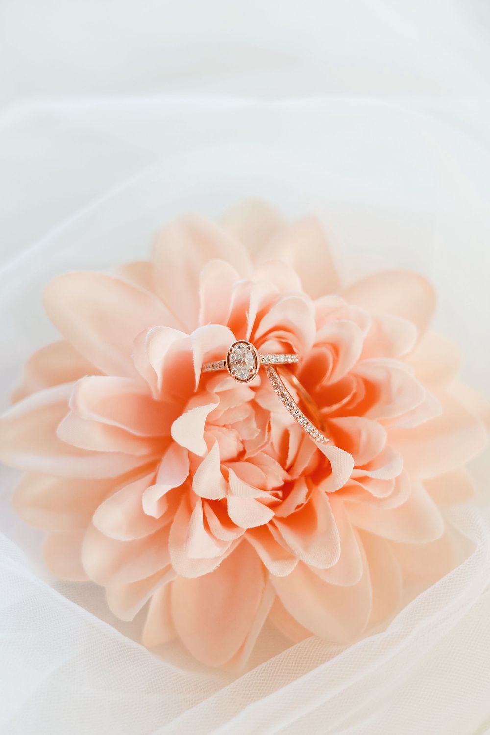 Detail shot of bride and groom's wedding rings and flower bouquet at The Magnolia Estate Rosewood Manor : Cincinnati wedding photographer