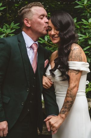 A romantic wedding photo sequence showing a couple in formal attire embracing among green foliage.