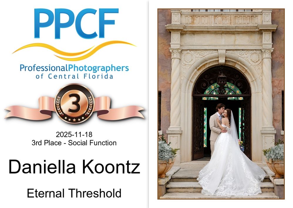 Professional photographer logo featuring a camera lens design with blue text and decorative elements.