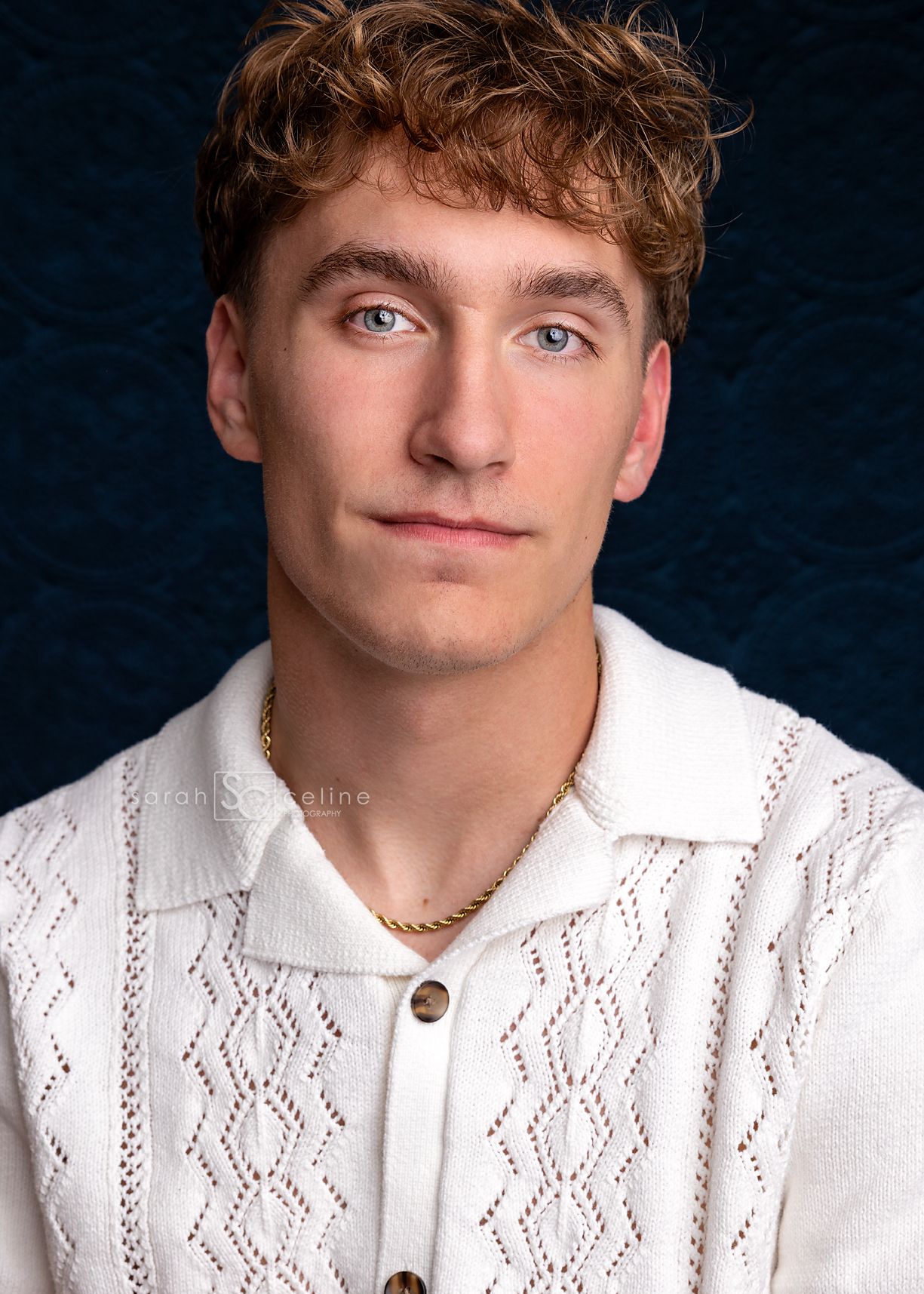 A collage of portrait shots against a dark background showing a person wearing a white knit sweater.