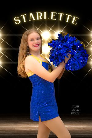 A dancer in a sparkly blue costume holds blue pom poms while performing under a glowing Starlette sign.