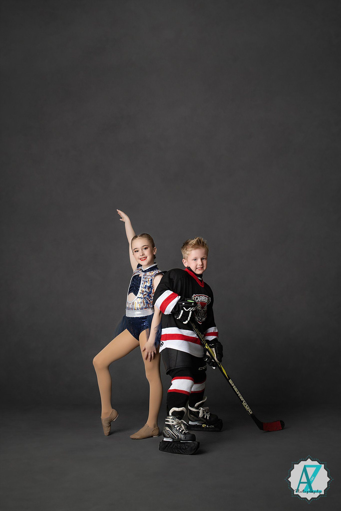 Youth athlete in goalie gear and American flag jersey sits in dynamic poses against dark background for sports photos.
