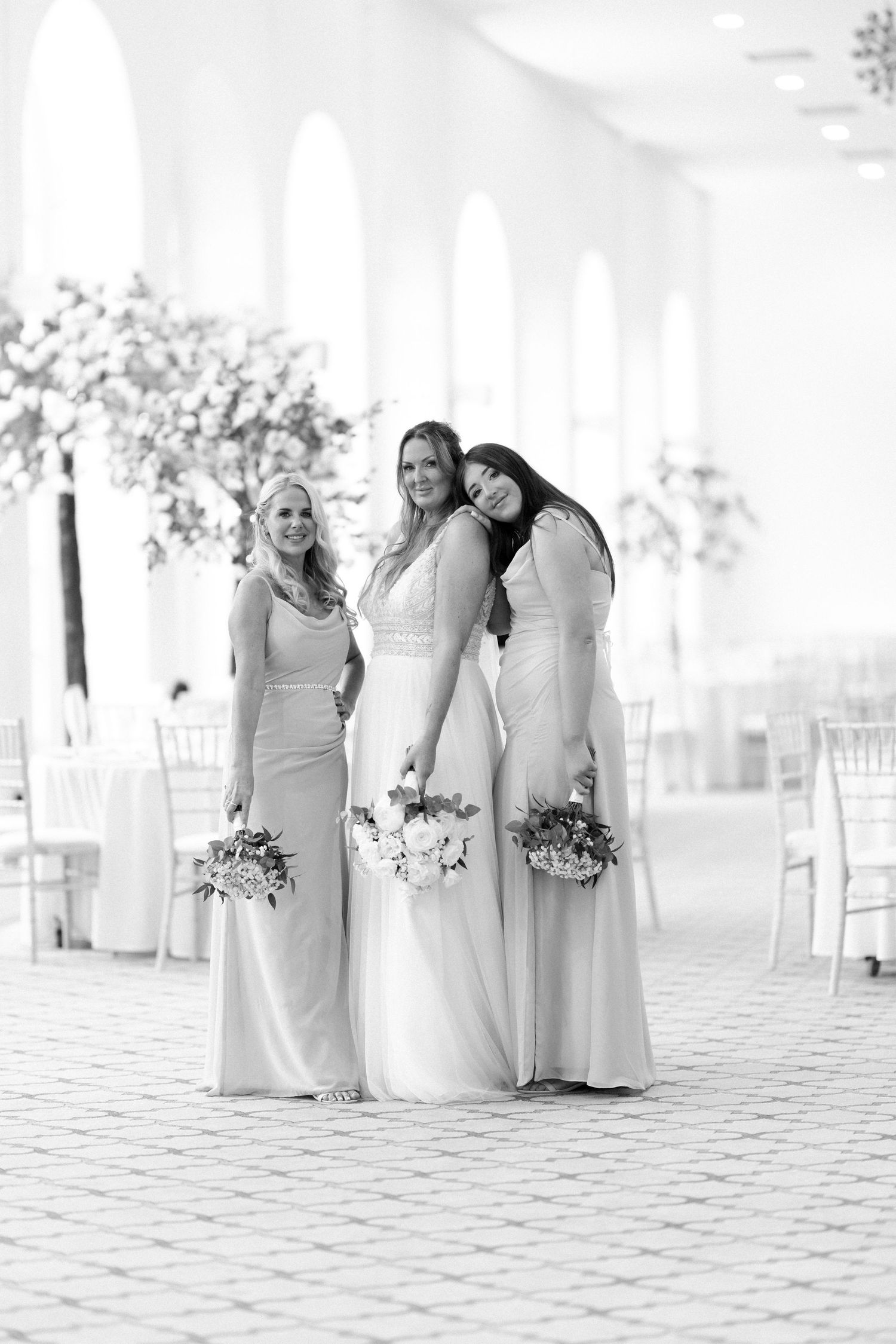bride and her daughter with bridesmaid at her wedding at Margam orangery