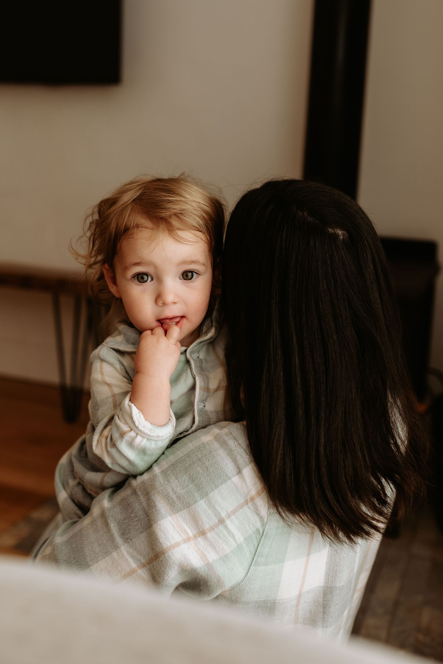 A candid moment of connection captured in soft natural lighting.