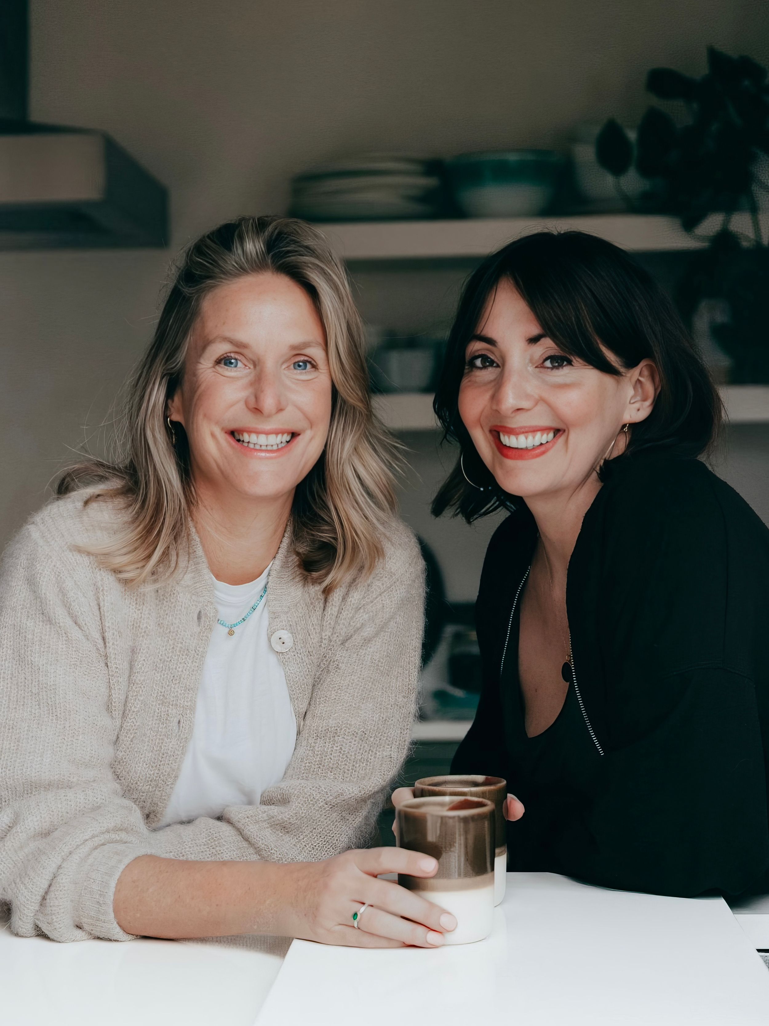 Two people smile while sitting together at a table with coffee cups, captured in a series of candid moments.