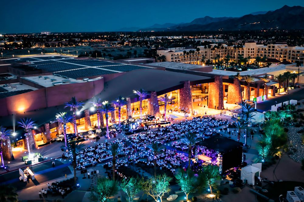 aerial drone photo of palm springs california convention center at night