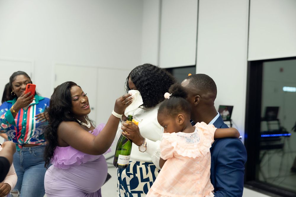 Candid moments of celebration and laughter at an indoor event.