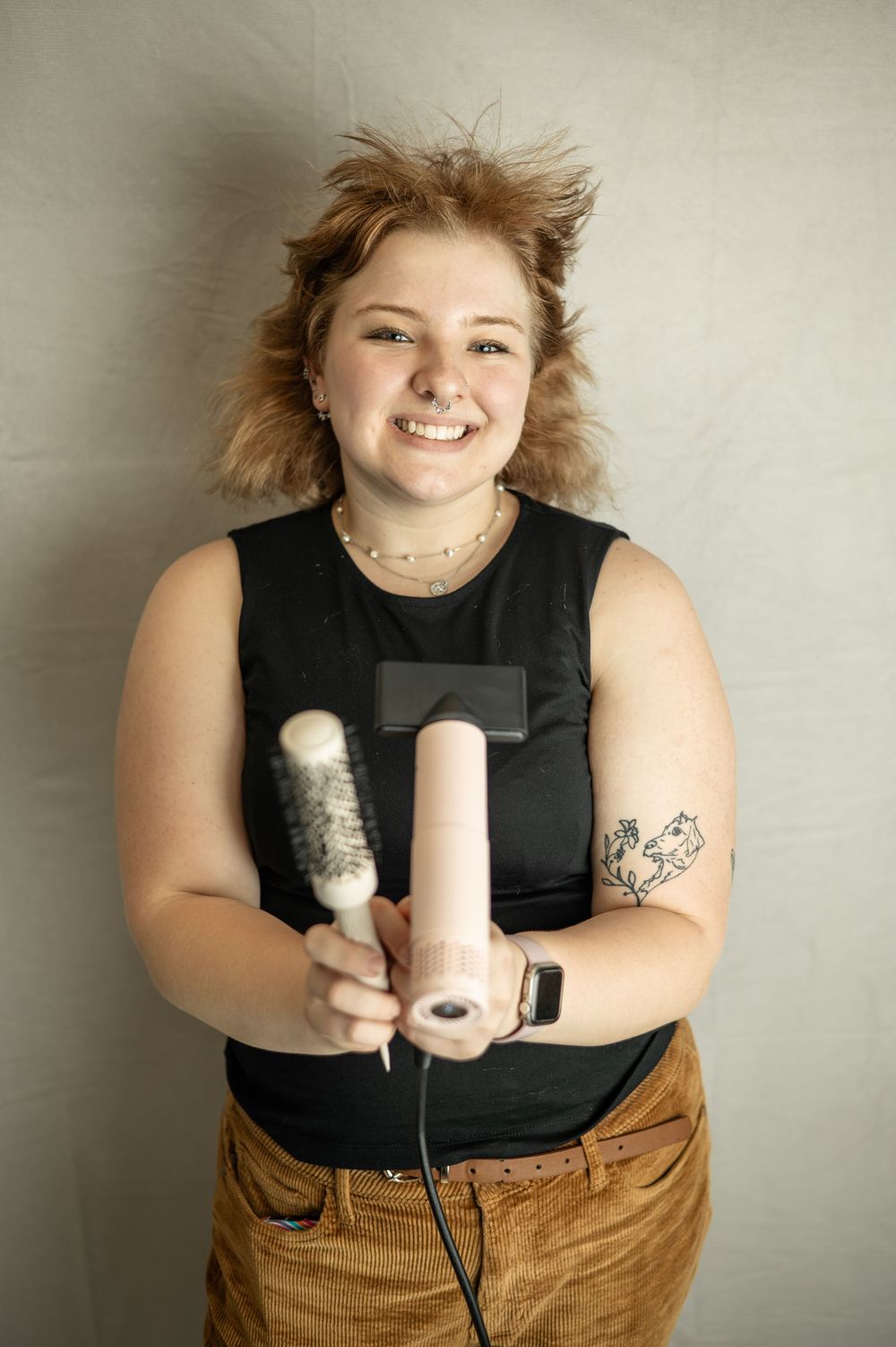 Three sequential photos showing hands holding vintage light bulbs against a plain beige background.