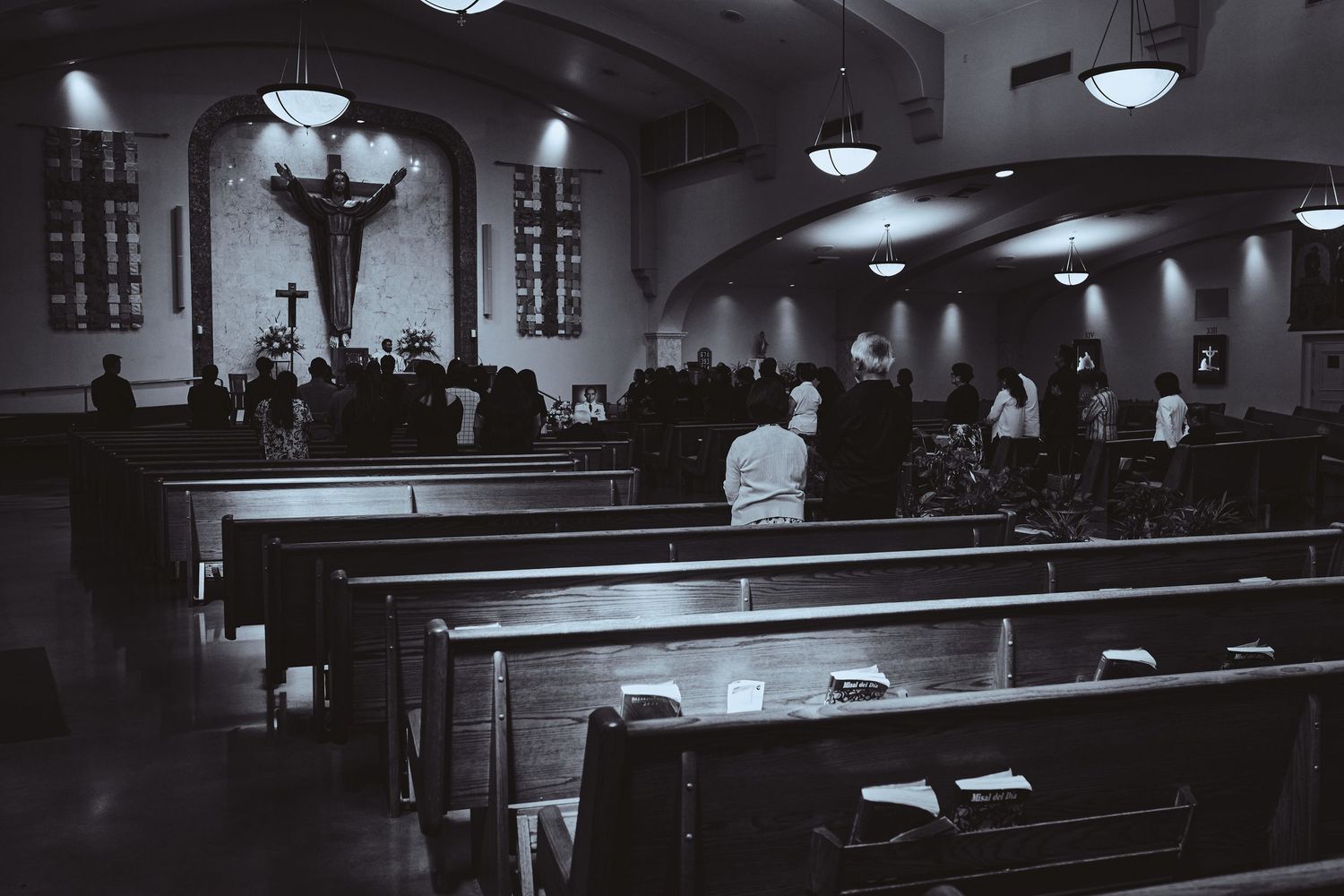 Vintage black and white photos showing legal courtroom proceedings with wooden benches and judges' podiums.