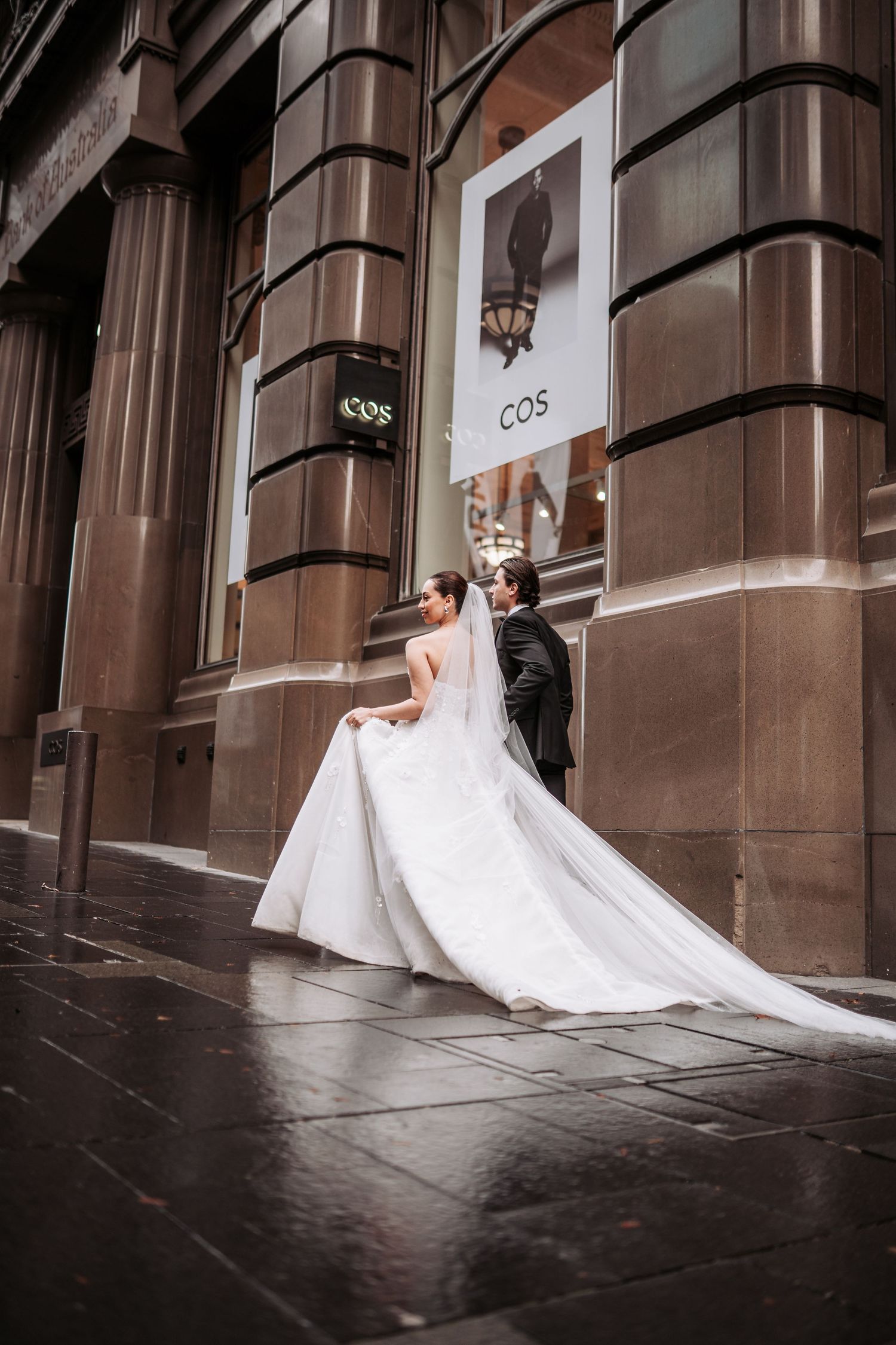 A bride in a flowing white wedding gown poses elegantly against a stone building facade in a progressive photo sequence.
