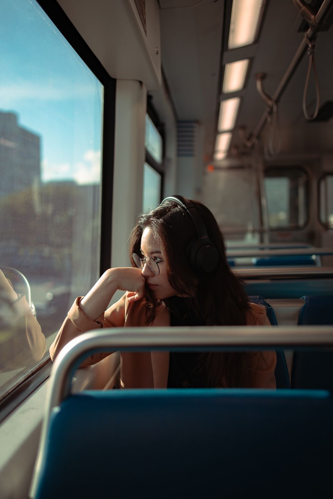 Cinematic Miami train portrait, golden hour light framing reflective mood. Editorial photography for actors by MannyPortraits.
