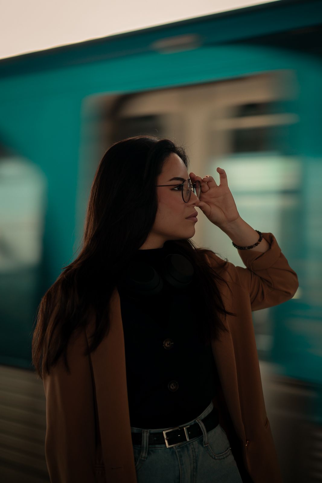 Editorial South Florida portrait with train in motion, cinematic travel photography inspired by Netflix dramas by MannyPortraits.