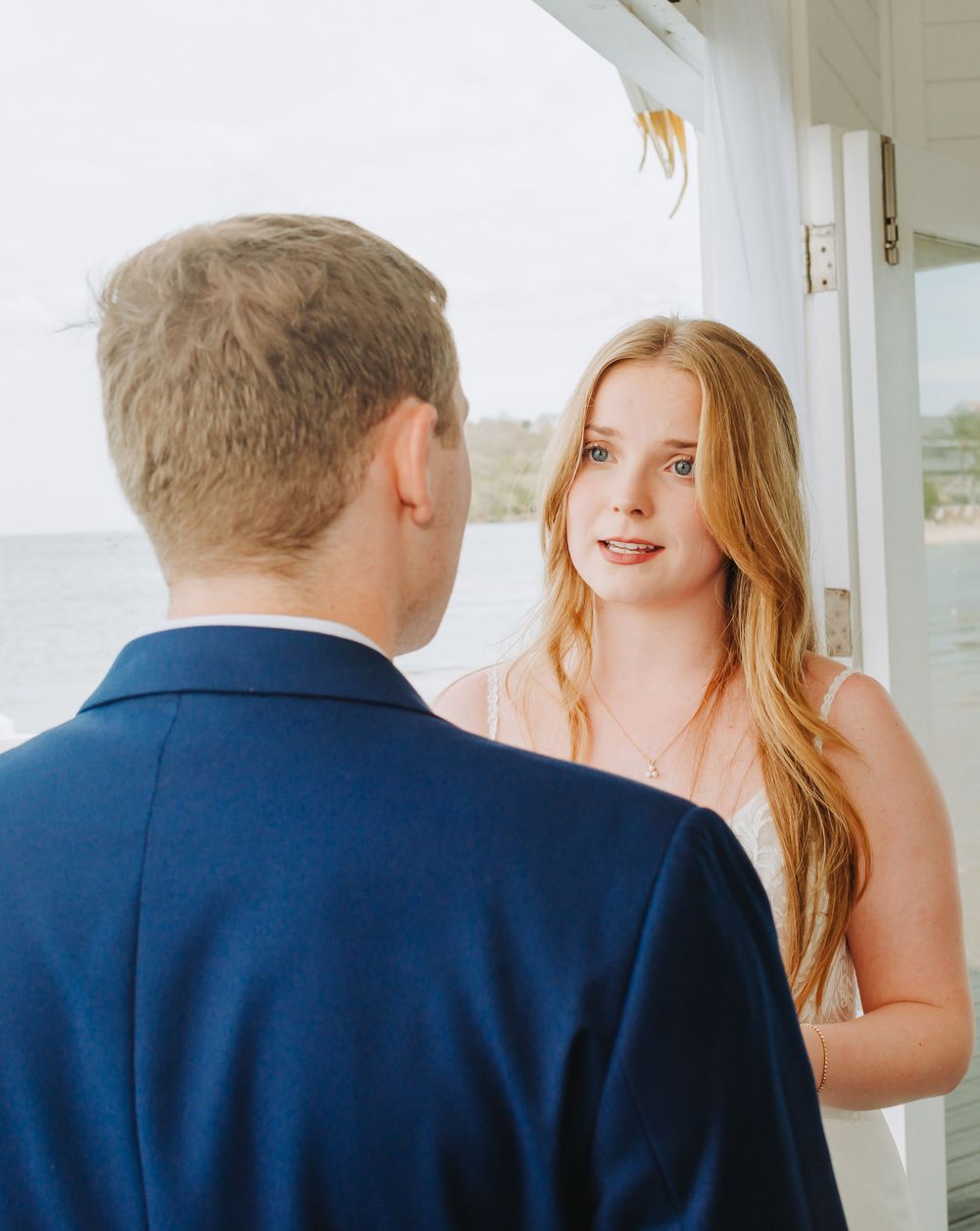 St Lucia  wedding photographer capturing intimate elopement wedding at Over the water chapel, Sandals Grande, St Lucia
