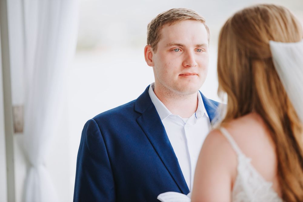 St Lucia  wedding photographer capturing intimate elopement wedding at Over the water chapel, Sandals Grande, St Lucia