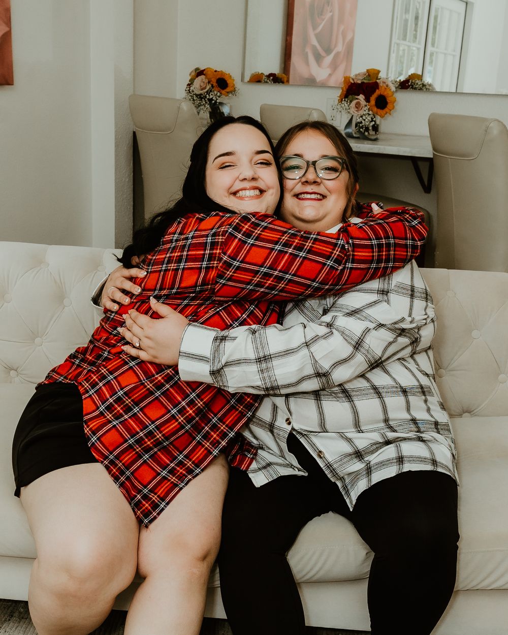 Collection of candid lifestyle photos with people lounging together on light colored furniture in plaid blankets.