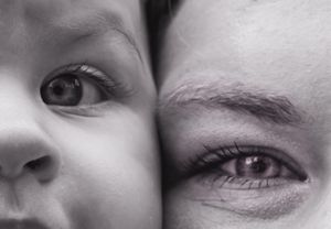 Extreme close-up macro shots of eyes and facial features in black and white.