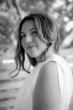 Black and white artistic portrait series showing an ethereal dreamy style with soft natural lighting and gentle expressions.