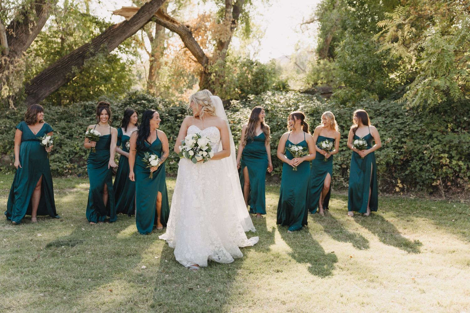 A collection of wedding party photos shows bridesmaids in teal dresses posing outdoors with the bride in a white gown.