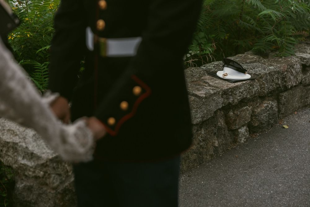 Wedding ceremony details on stone steps in natural outdoor lighting.