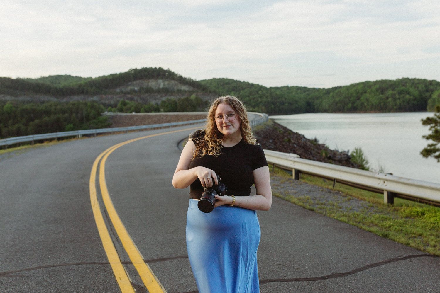 Georgia elopement photographer sydney shepherd photo posing with her camera