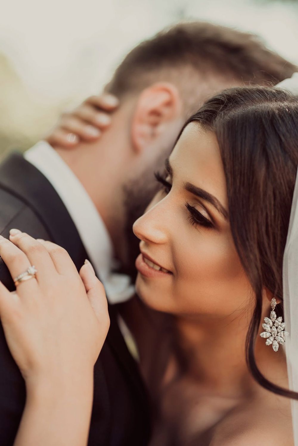 A collage of intimate wedding moments showing romantic close-up shots of a couple in formal attire.