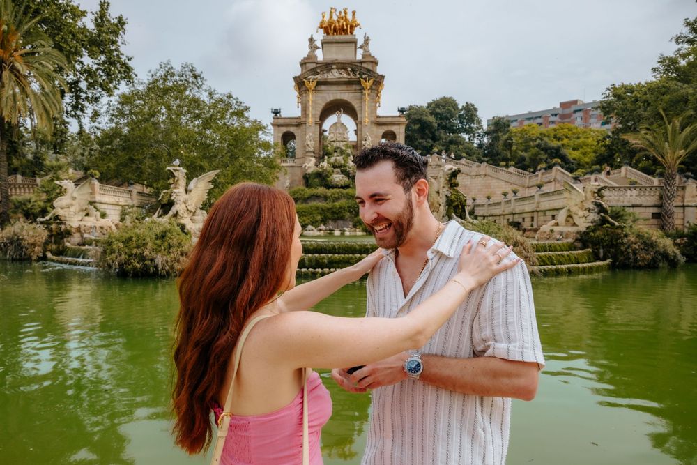 Alan & Ella holding hands in Barcelona sunshine.