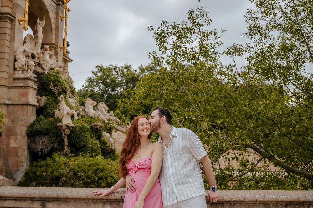 Candid laughter as they celebrate their engagement.