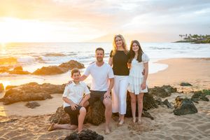 Maui family photographer photo against beautiful Maui sunset beach by ohwowfotos.