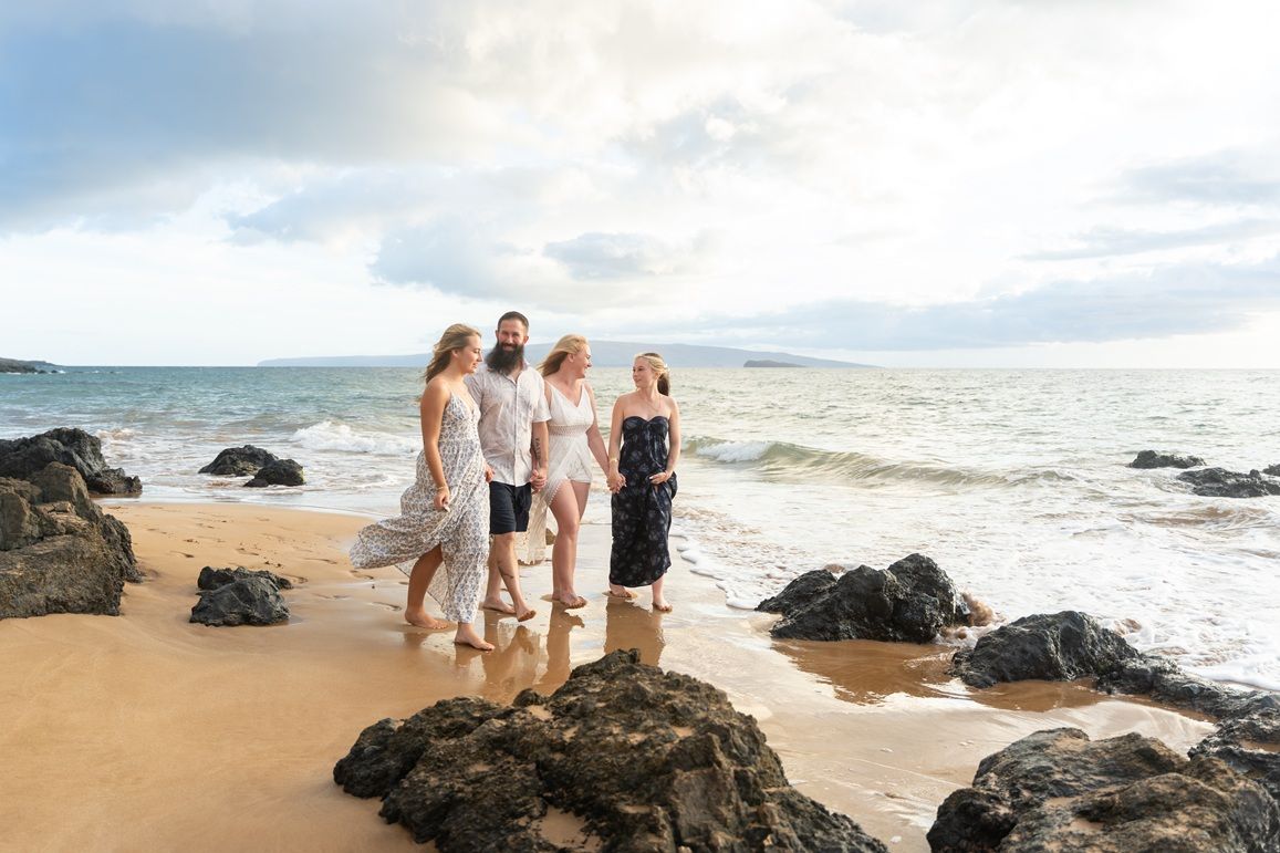Maui family photographer photo against beautiful Maui sunset beach by ohwowfotos.