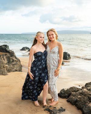 Maui family photographer photo against beautiful Maui sunset beach by ohwowfotos.