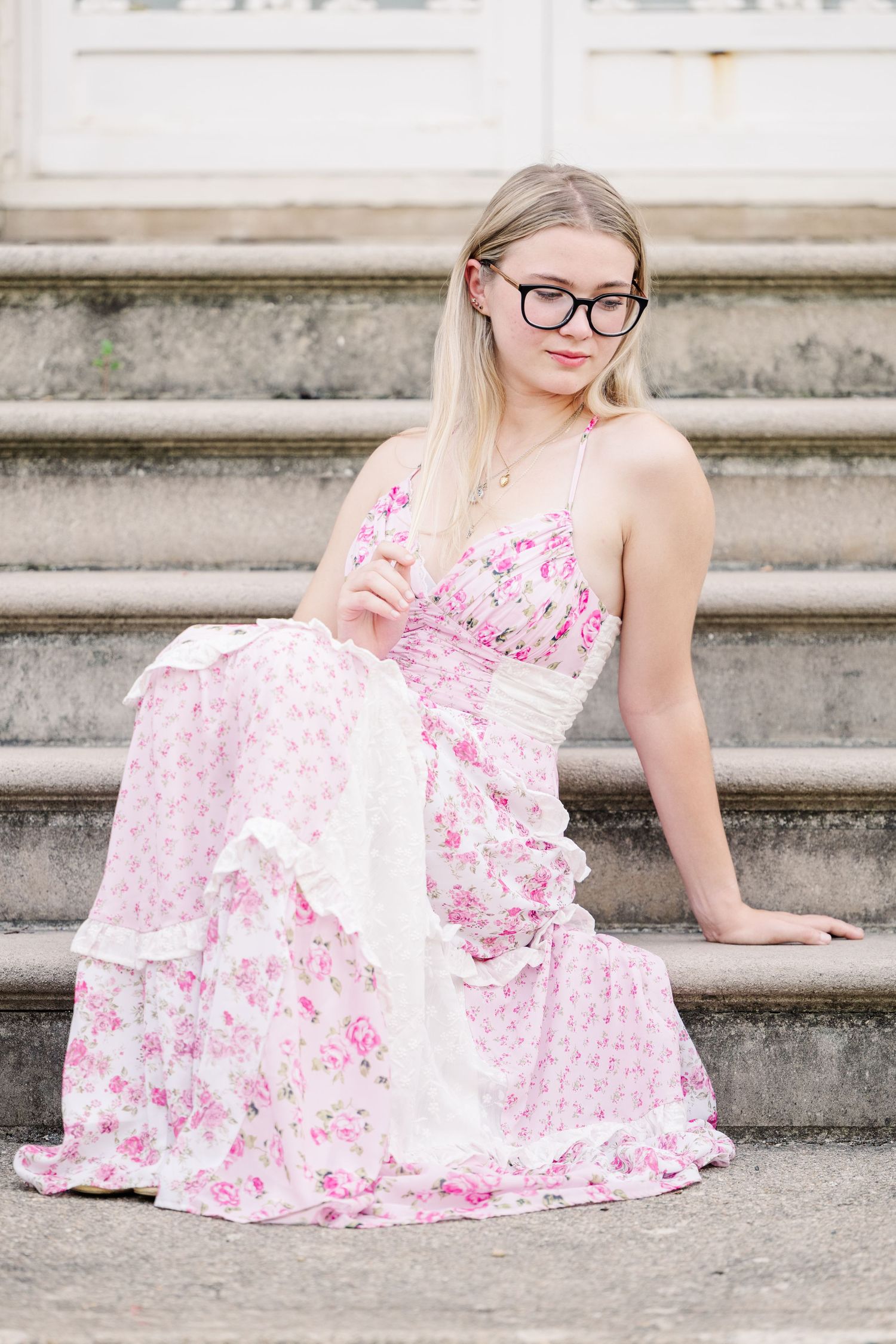 Elegant female high school senior girl portrait during photo session at Coxhall Gardens in Carmel Indiana