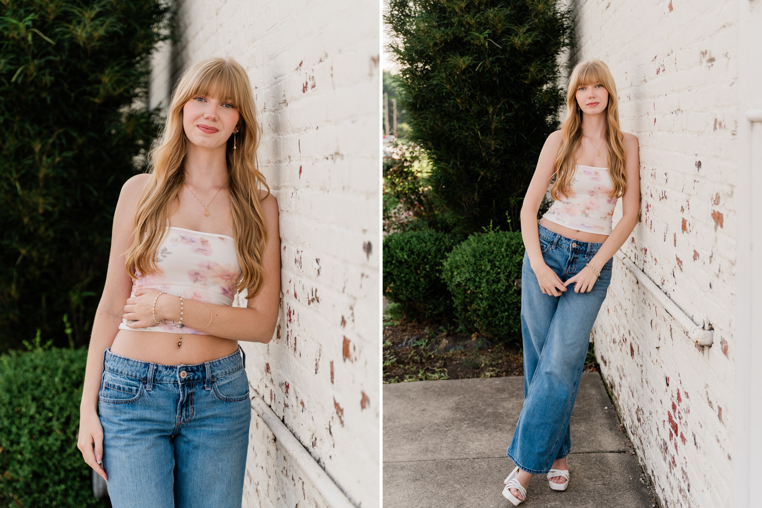 Someone in light top and blue jeans poses against distressed white wall in outdoor fashion photoshoot.
