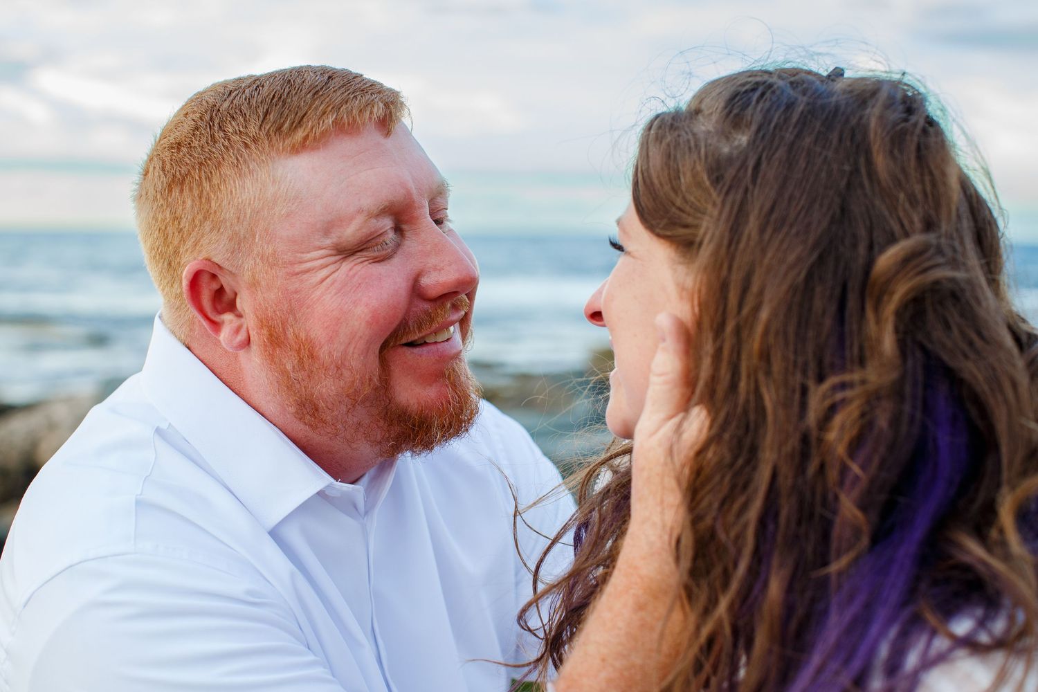Elopement on the beach at Balneario del Escambrón in Old San Juan, Puerto Rico. Couples portrait - bride and groom.