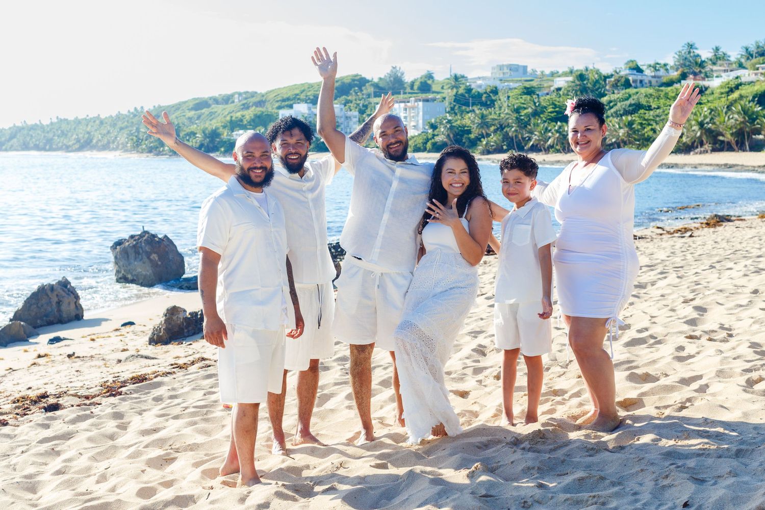 Family portrait on the beach. Marriage proposal. Playa Mar Chiquita, Puerto Rico.