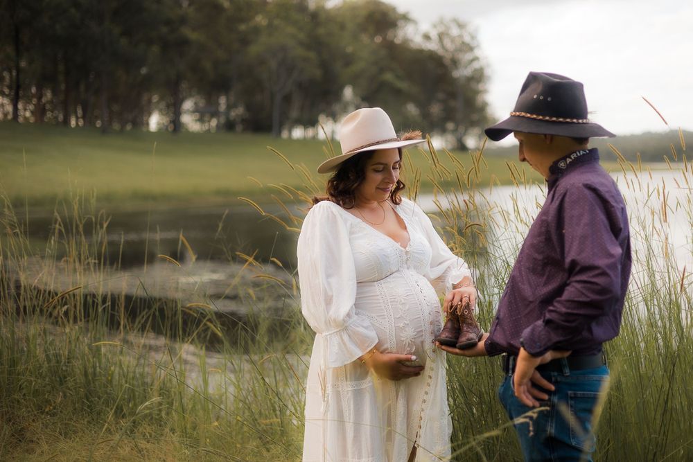 Amazing maternity portrait taken on the Brisbane Northside with natural light, capturing the joy of expecting parents