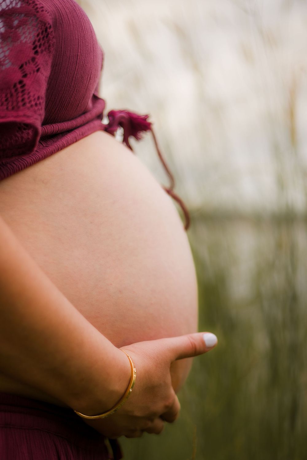 A beautiful baby bump maternity portrait taken on the Brisbane Northside with natural light, capturing the joy of an expecting Mother